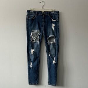Distressed Blue Jeans